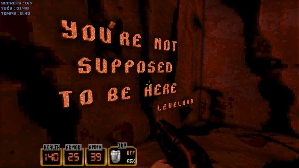 Надпись «You're not supposed to be here — Levelord» на стене в Duke Nukem 3D.